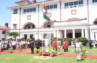 Honorable Governor saluting the National Flag.