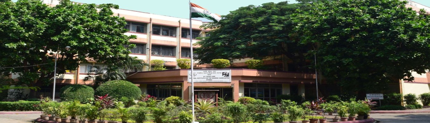 The front view of the Ali Yavar Jung National Institute of Speech and Hearing Disabilities with Indian National Flag in front