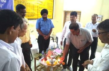 Lig hting candle at the launching of the system by Shri C.K. Dhar Senior Technical Director & SIO