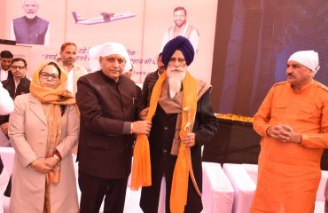 Honoring Pradhan ji with Saropa