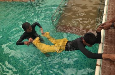 Person affected with Cerebraly Palsy getting rehabilitation service at Hydrotherapy Pool
