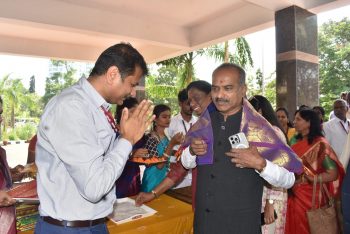 Dr.Nachiketa Rout presenting Shawl to Shri.P.C.Mohan, Chairman, Standing Committee on Social Justice and Empowerment