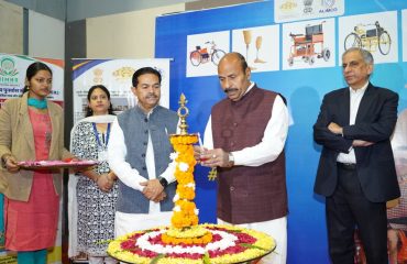Dr.Virendra Kumar, Minster for Social Justice and Empowerment, GoI, Lighting the Lamp during the inauguration of DEPwD Pavilion at IITF 2025