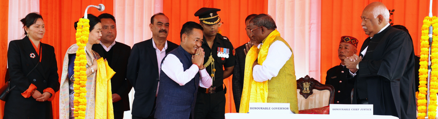 Chief Minister of Sikkim greeting Honourable Governor on his oath taking ceremony in presence of Honourable Chief Justice.