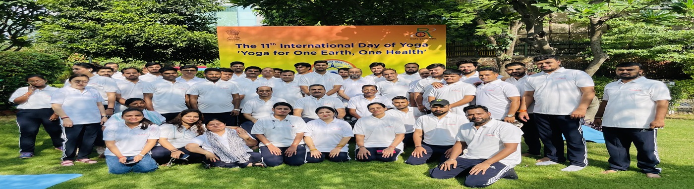 Website banner showing a group photo of RCI officials celebrating the 11th International Yoga Day