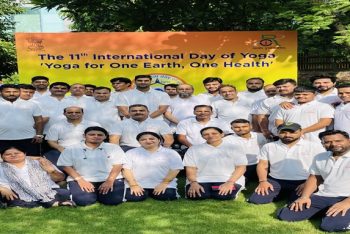 Website banner showing a group photo of RCI officials celebrating the 11th International Yoga Day