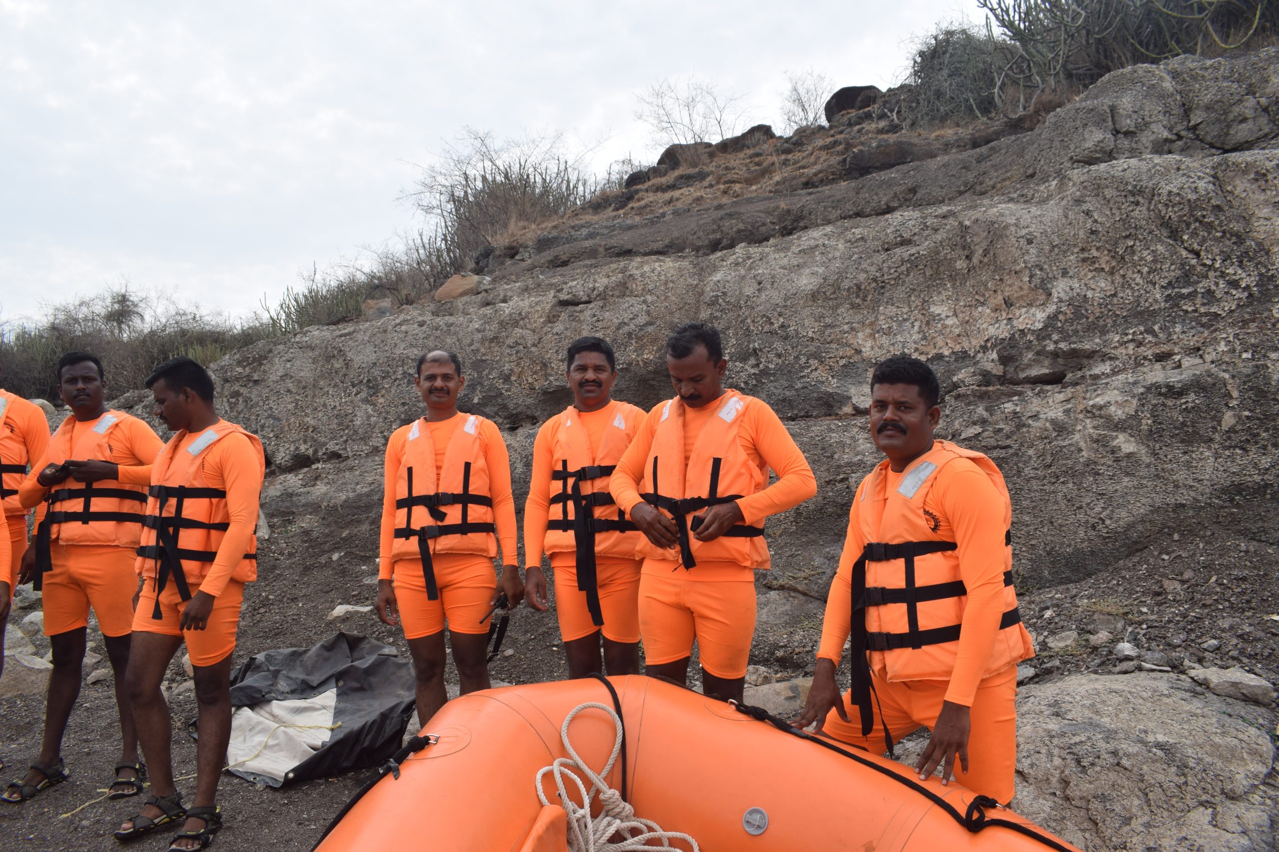 Post-drill moment: SDRF team members with a life boat after the mock exercise