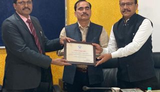 Moradabad Commissioner Awarding Prize