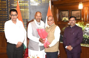 Felicitation of Governor by Dr. Uttam Ojha