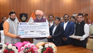 Haryana State Warehousing Corporation hands over cheque of Rs 2.35 crore to Haryana Honorable CM as dividend for the financial year 2021-22