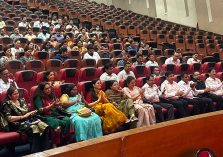 Officers and Employees listening to lecture