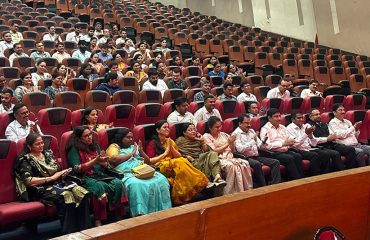 Officers and Employees listening to lecture