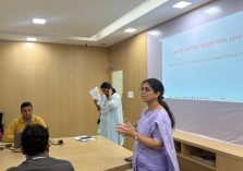 Secretary Kalpana Jagtap speaking at a training program organized for the officers and employees of the MMR SRA