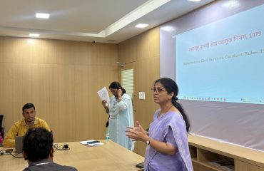 Secretary Kalpana Jagtap speaking at a training program organized for the officers and employees of the MMR SRA
