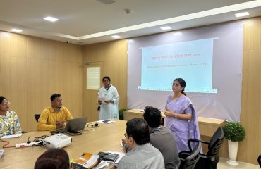 Secretary Kalpana Jagtap speaking at a training program organized for the officers and employees of the MMR SRA