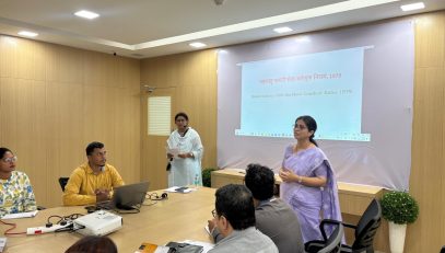 Secretary Kalpana Jagtap speaking at a training program organized for the officers and employees of the MMR SRA