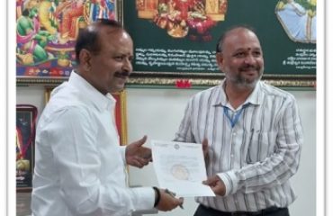 Commissioner, Endowments Department issuing the appreciation letter to Sri T. Sridhar Sharma, Scientist-E, NIC, Telangana State Unit