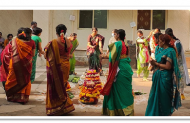 Shri. Peter Francis Thambusamy A, DDG & SIO-TS & Head NIU, Hyderabad lighting the lamp during Batukamma celebration at NIC Telangana state unit , Hyderabad.