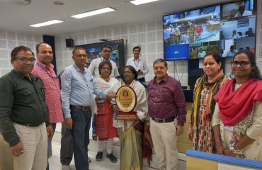 AINOA SEB Team handing the ANIOA Memento to Smt Sunanada