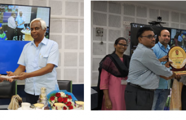 (left)SIO-TS & Head NIU handing the gift to Shri.G D Vinod Kumar(Right)AINOA SEB Team handing the ANIOA Memento to Shri. G D Vinod Kumar