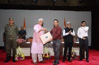 Sh Asheesh Dogra (SC D) being felicitated by Hon’ble LG JK Sh. Manoj Sinha