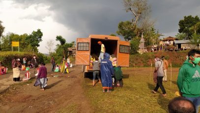 Villagers receiving Rice and Dal at Mawlyngngai Village