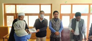 EC Health Mohsin Ali distributes YounTab Edu Tabs among students at GHS Hagnis (1)