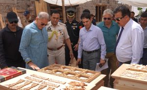 Hon’ble LG Kavinder inspects work of Padma Shri awardee woodcarving artist Tsering Namgail