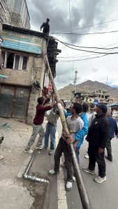 Special Drive Initiated to Remove Unnecessary Poles and Hanging Wires in Kargil City.