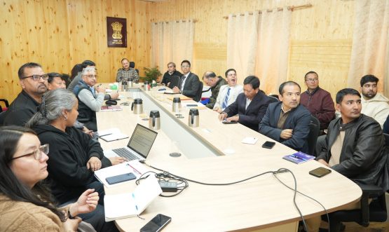 Chief Secretary Dr. Pawan Kotwal Chairs Meeting to Review Compliance Reduction and Deregulation under Ease of Doing Business (EoDB) Leh, May 01, 2025: The Chief Secretary of the Union Territory of Ladakh, Dr. Pawan Kotwal, chaired a meeting at the Civil Secretariat in Leh to review the progress of compliance reduction and deregulation initiatives under the Ease of Doing Business (EoDB) framework. The meeting began with a comprehensive PowerPoint presentation by Bhupesh Chaudhary, Administrative Secretary, UT Ladakh. The presentation outlined key priority areas and action points aimed at enhancing the EoDB environment in the Union Territory. It also highlighted sector-specific challenges, proposed regulatory simplifications, and a roadmap for implementation. In his address, Dr. Kotwal emphasized the need to modernize, digitize, and streamline regulatory frameworks to foster a more business-friendly and citizen-centric administration. He stressed the importance of prescribing the appropriate authority for building construction as per existing building laws. He further directed the adoption and implementation of the Building Operation Controlling Authority (BOCA) guidelines and the Panchayati Raj Act. Dr. Kotwal suggested the formation of a deregulation committee to oversee the implementation of land laws, building laws, BOCA, and the Panchayati Raj Act. He directed the Assistant Commissioner Revenue (ACR) Leh to prepare the Change of Land Use (CLU) proposal for approval from the Hon’ble Lieutenant Governor. The Chief Secretary also directed departments to launch an online portal to simplify and digitize service delivery. He instructed that services covered under the Public Services Guarantee Act should also be integrated into the EoDB framework. Concerned departments were given a timeline of 10 days to operationalize the portal and reduce the number of checklist items required for various approvals. The meeting was attended by Principal Secretary Sanjeev Khirwar; Administrative Secretaries Bhupesh Chaudhary and Shashanka Ala; Additional Secretary Shashi Kant Bhagat; Chief Conservator of Forests Sajjad Hussain Mufti; Chief Engineer, LPDD, Tsewang Paljor; SIO, NIC Ladakh; OSDs; Under Secretaries; representatives from the Project Monitoring Unit (PMU) of the Tourism Department; and other concerned officials.