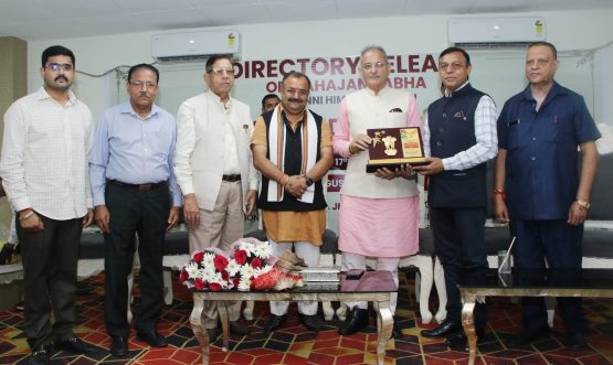 Hon’ble LG Kavinder Lt Governor releasing a Directory of Mahajan Sabha Channi Himmat at a function
