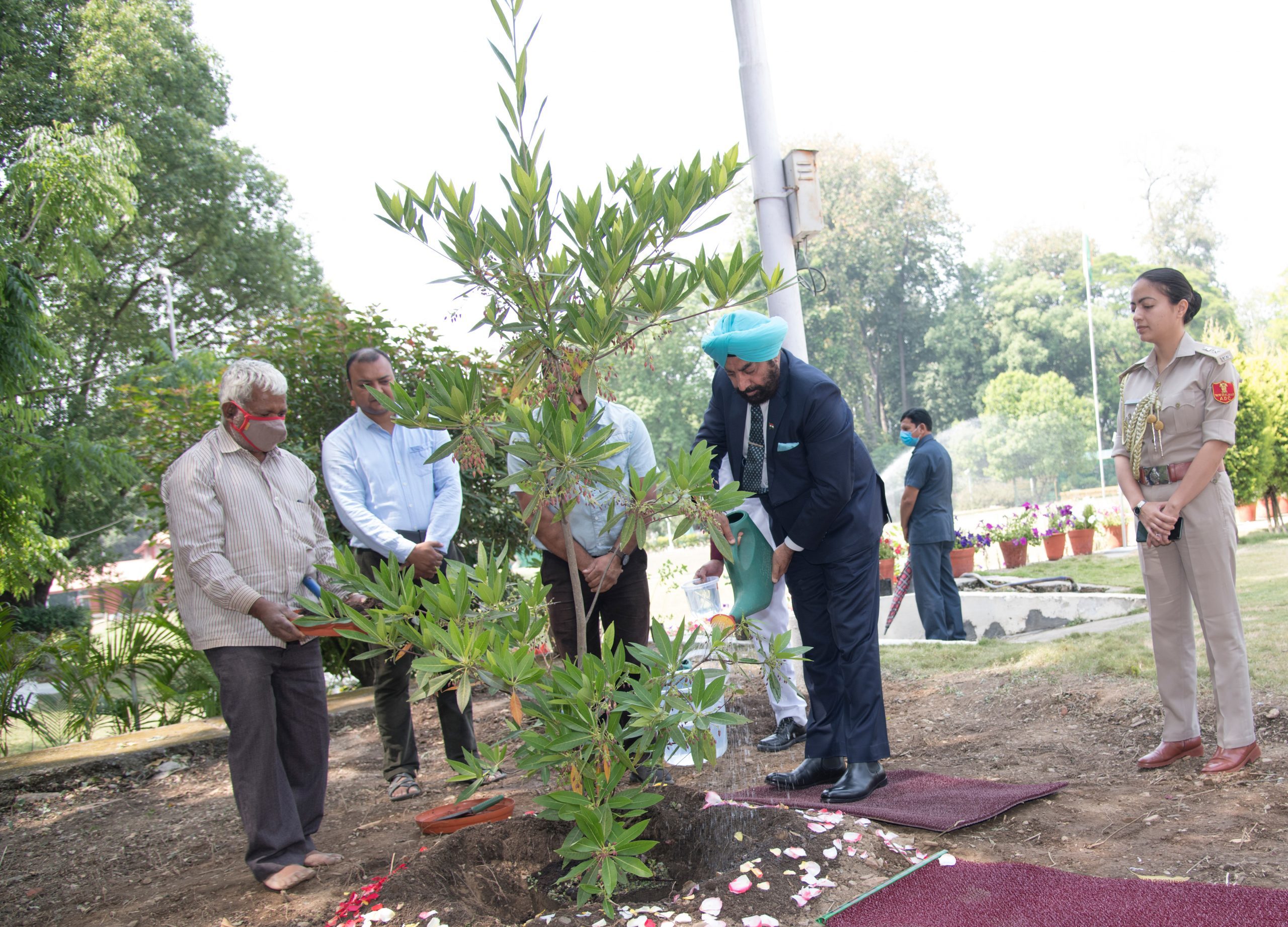 Governor planting a sapling of Rudraksha on the occasion of World Earth Day in Raj Bhawan premises.