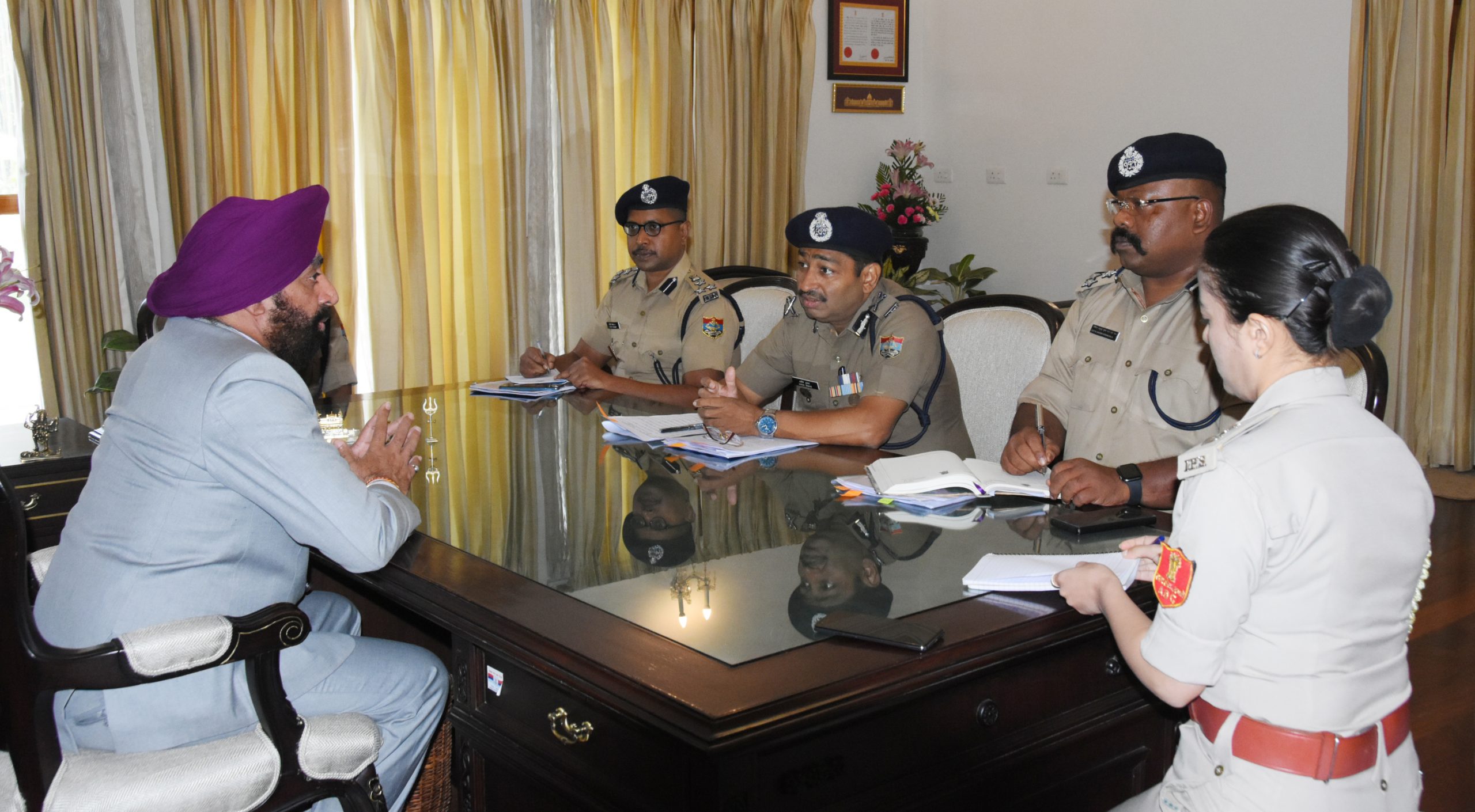 24-06-2022 : Governor chairing a meeting with senior officers of the Police Department at Raj Bhawan.