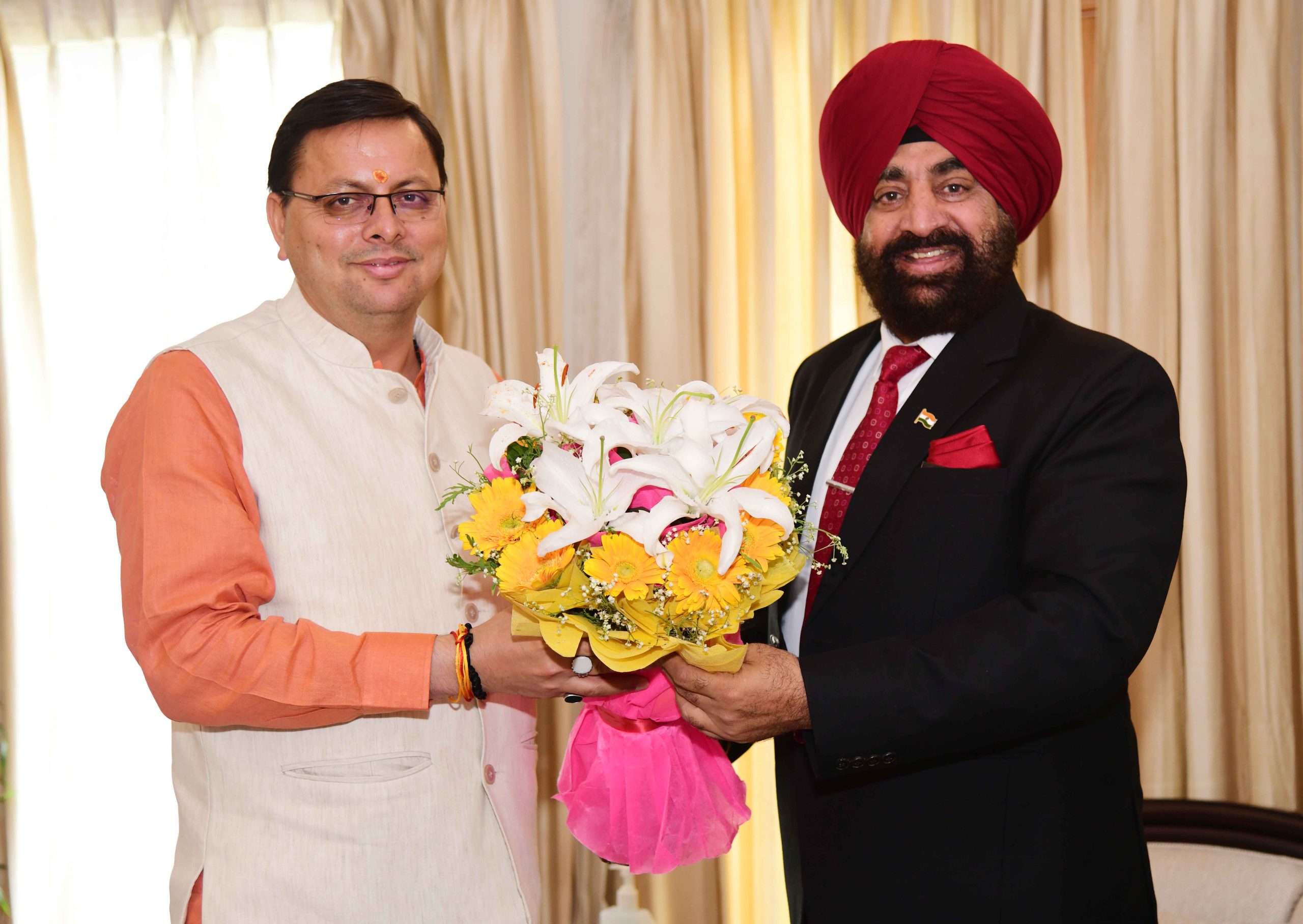 Chief Minister, Shri Pushkar Singh Dhami calling on the Governor.