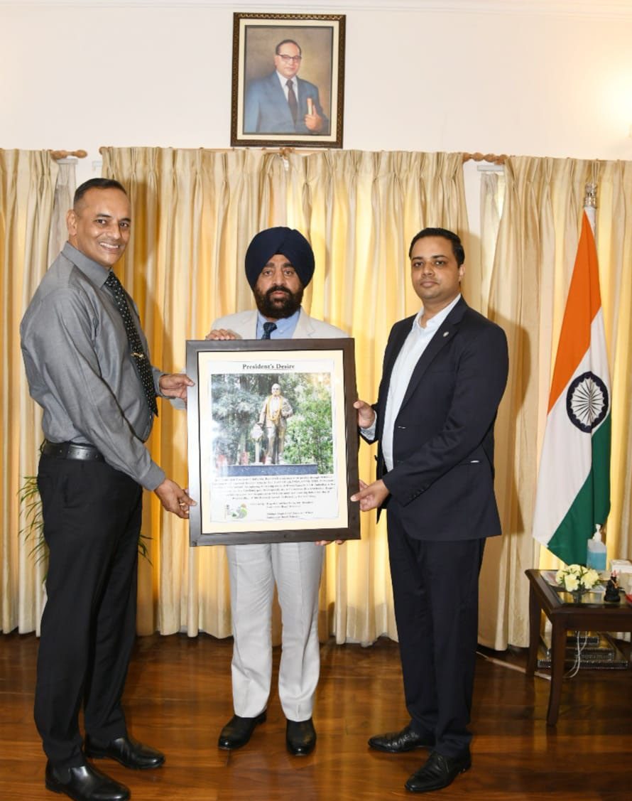 Dehradun Cantt Board Chairman Anirban Dutta and CEO Abhinav Kumar presenting a photo of Bharat Ratna Dr. Bhimrao Ambedkar to the Governor.