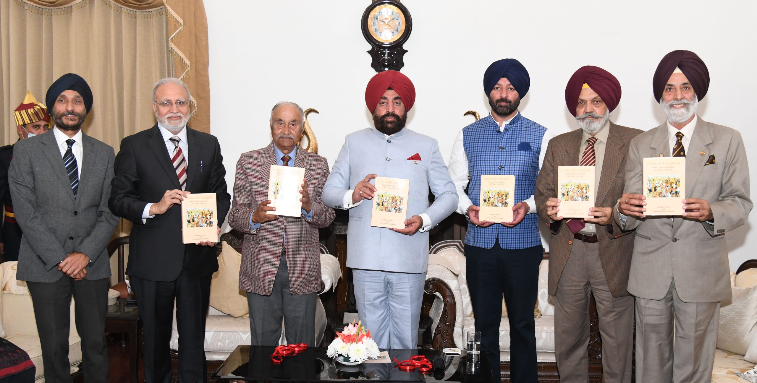 Governor Lt Gen Gurmeet Singh (Retd) releasing the book “ALONG CAME A WARRIOR: BANDA’S DHARAMYUDH AND THE SIKH THEORY OF JUST WAR”.