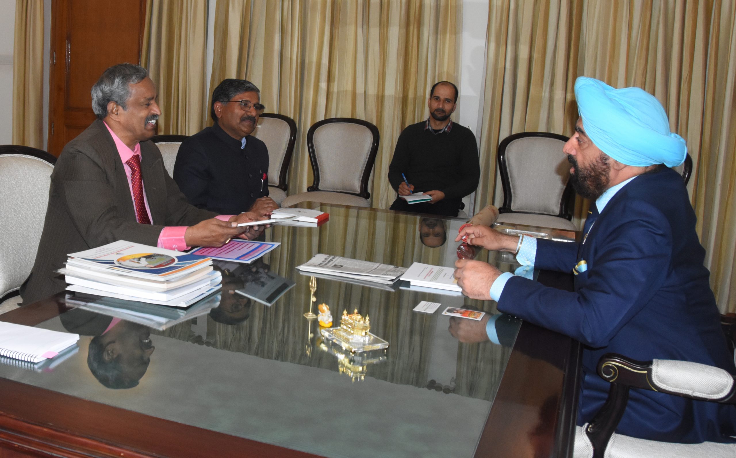 Dr. Shanmugam Mahalingam and Chairman, Public Service Commission Dr. Rakesh Kumar called on the Governor.