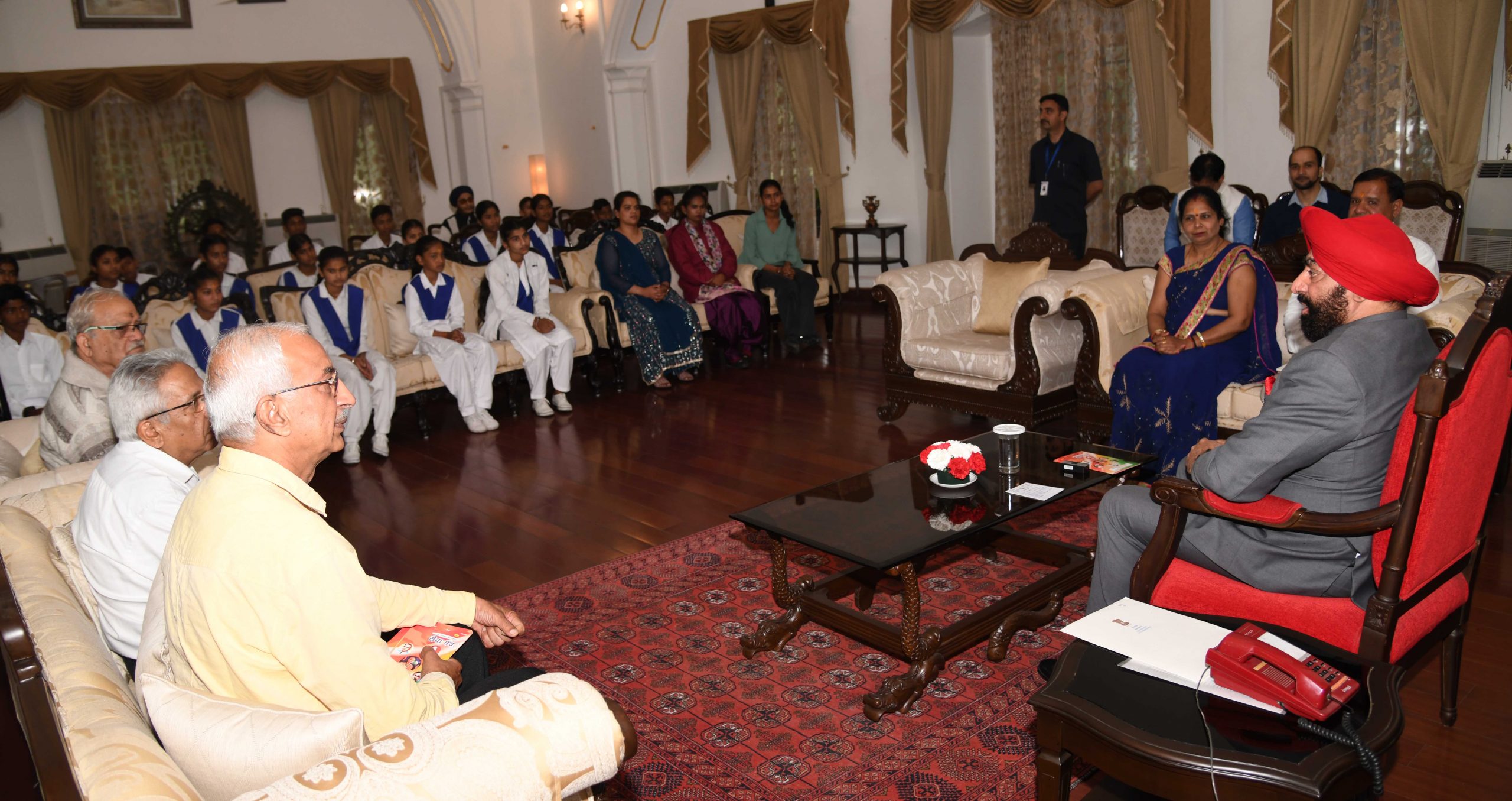 Governor interacts with the children of Swami Vivekananda Seva Sansthan at Raj Bhawan.