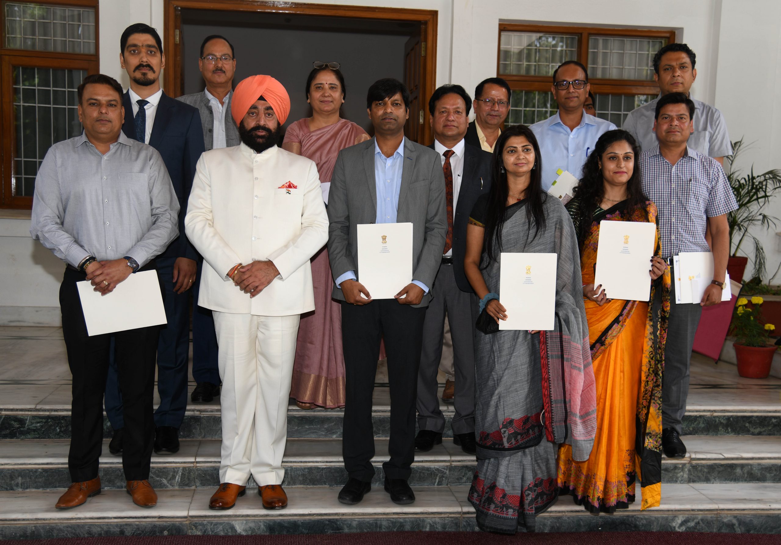 Governor Lt. Gen. Gurmit Singh (Retd) with meritorious students and research scholars.