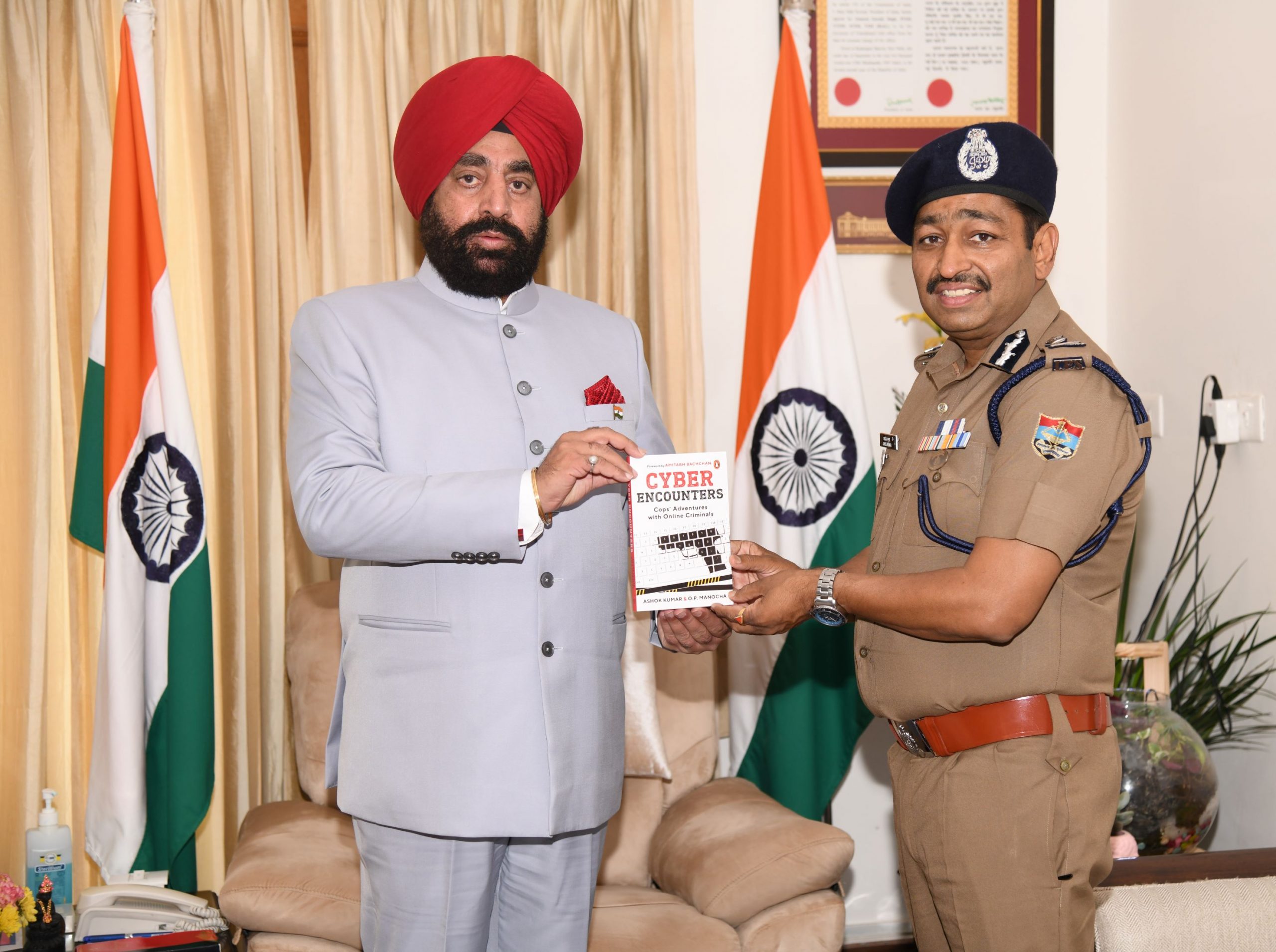 DGP Ashok Kumar paying a courtesy call on Governor.