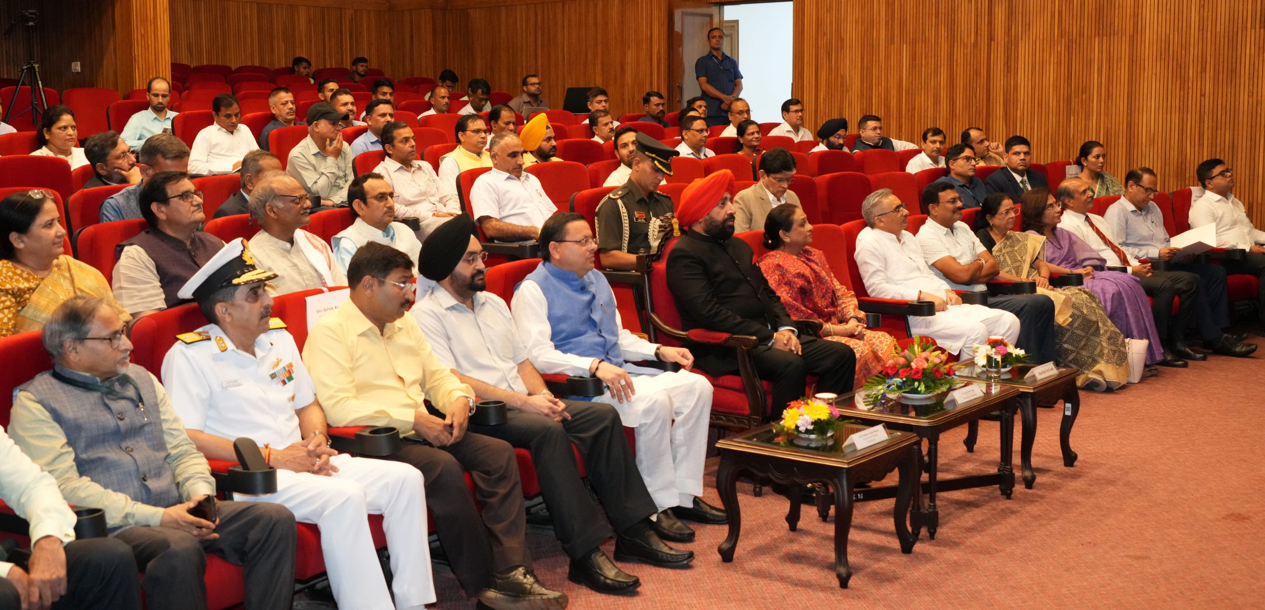 Governor Lt Gen Gurmit Singh (Retd) and Chief Minister Pushkar Singh Dhami watch the short film “Two years on the path of duty in Devbhoomi” in a program organized at Raj Bhawan.