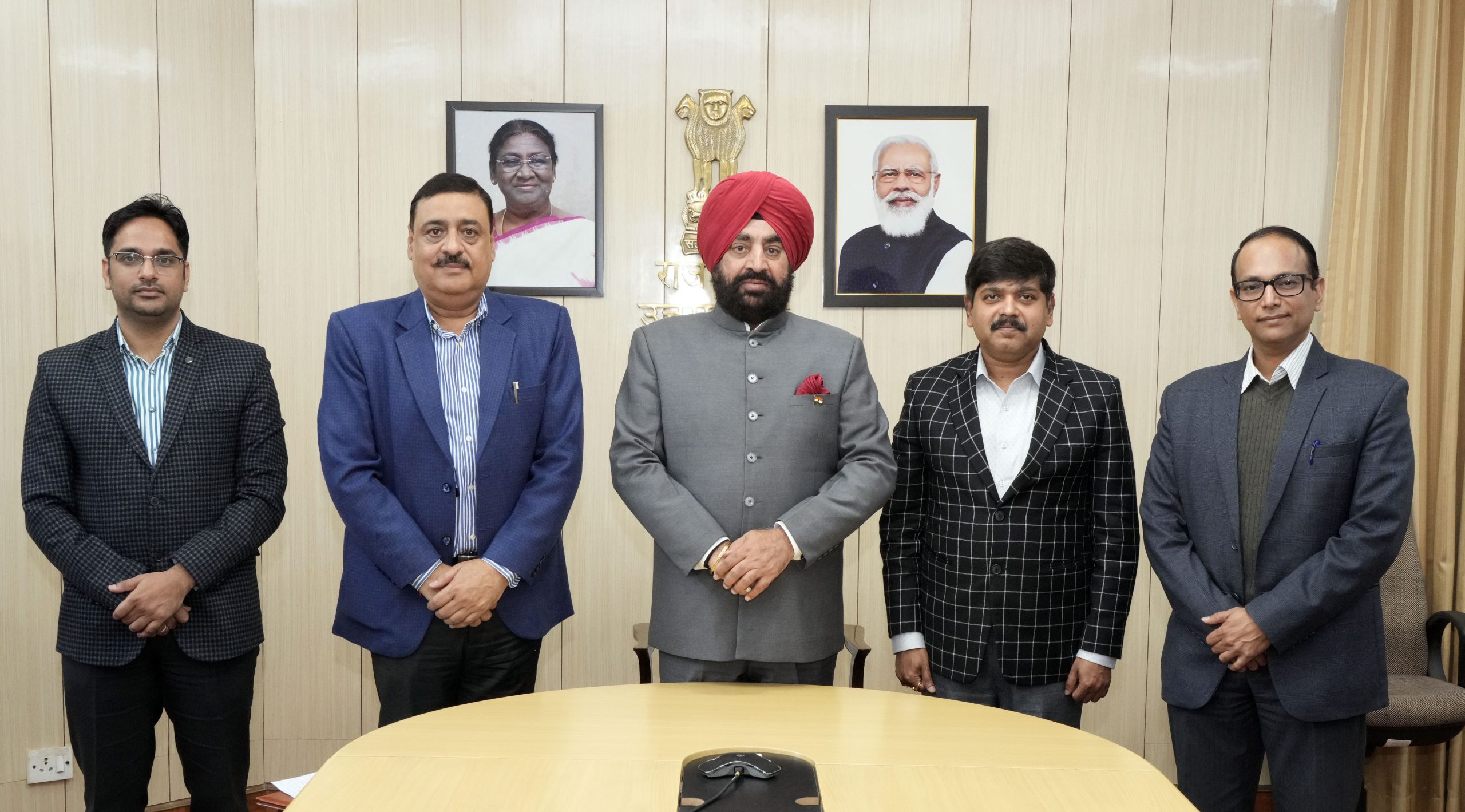 Planning Secretary, Industries Secretary and Director General Industries giving information to the Governor about the preparations and progress of the Global Investors Summit to be organized in Uttarakhand.