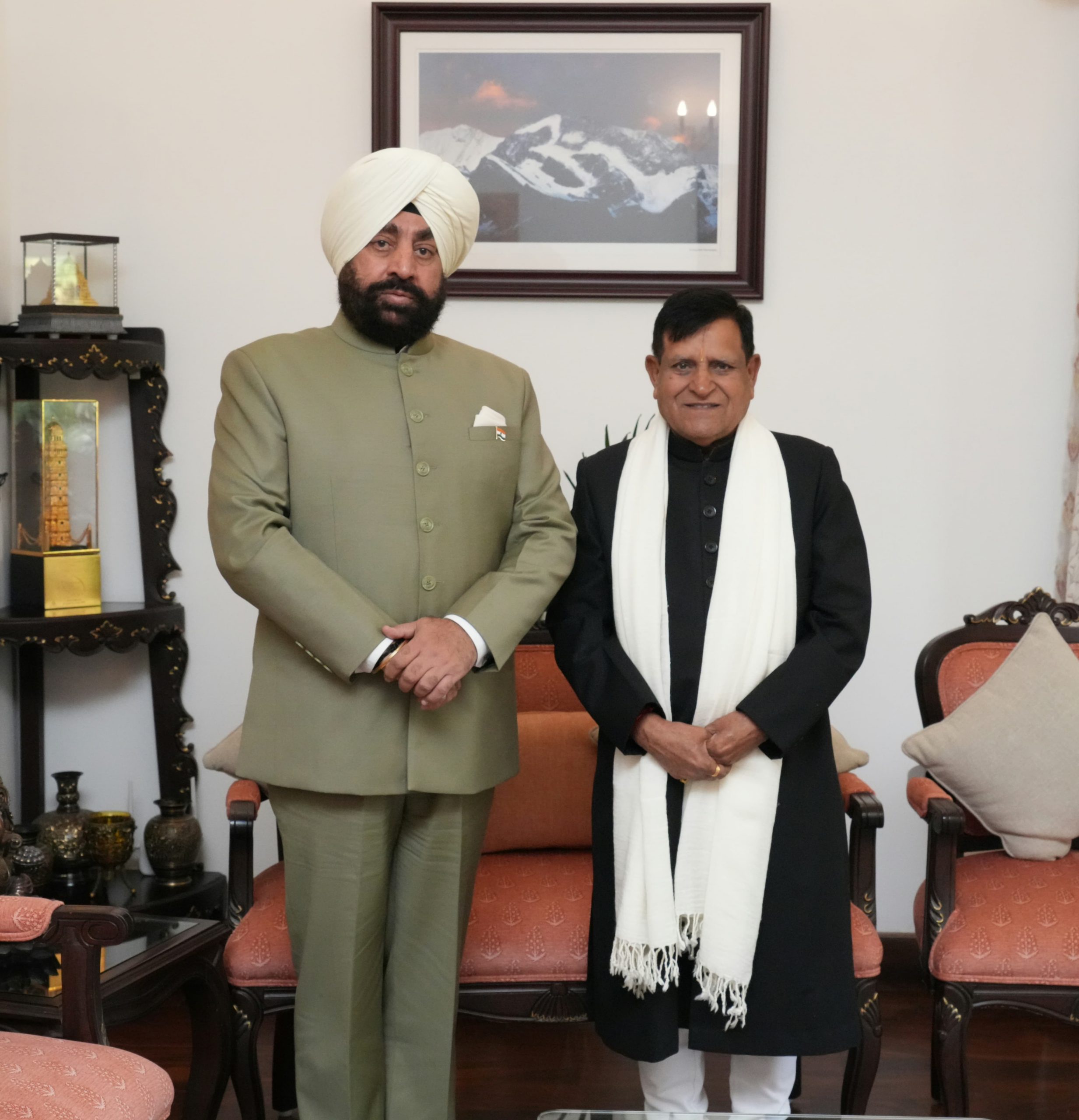 1. Astrologer Acharya Pandit Lekhraj Sharma paying a courtesy call on Governor Lt Gen Gurmit Singh (Retd).