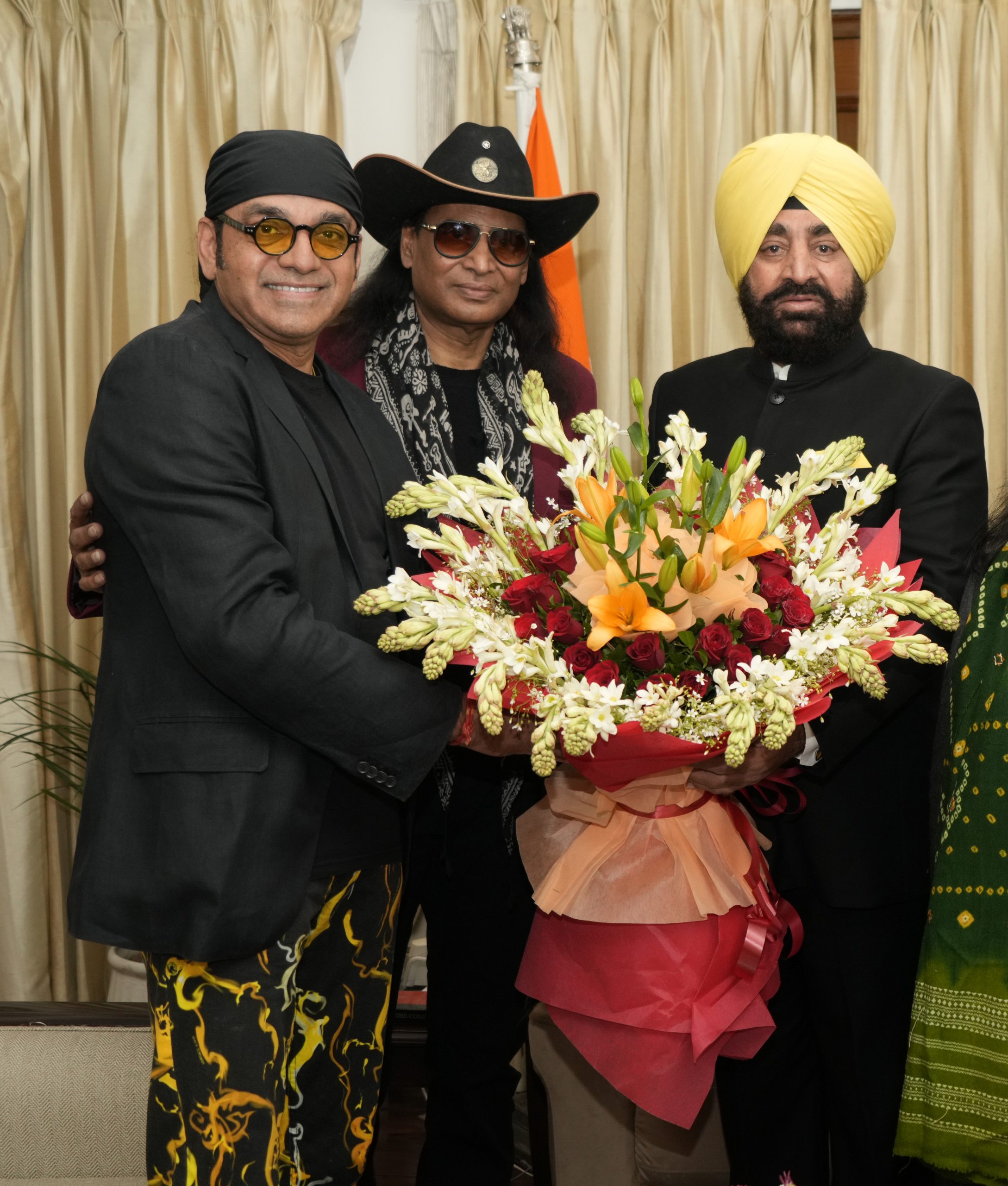Director Anupam Sharma and executive producer Bobby Cash of the film 'One in a Billion' pay courtesy call on Governor Lt Gen Gurmit Singh (Retd).