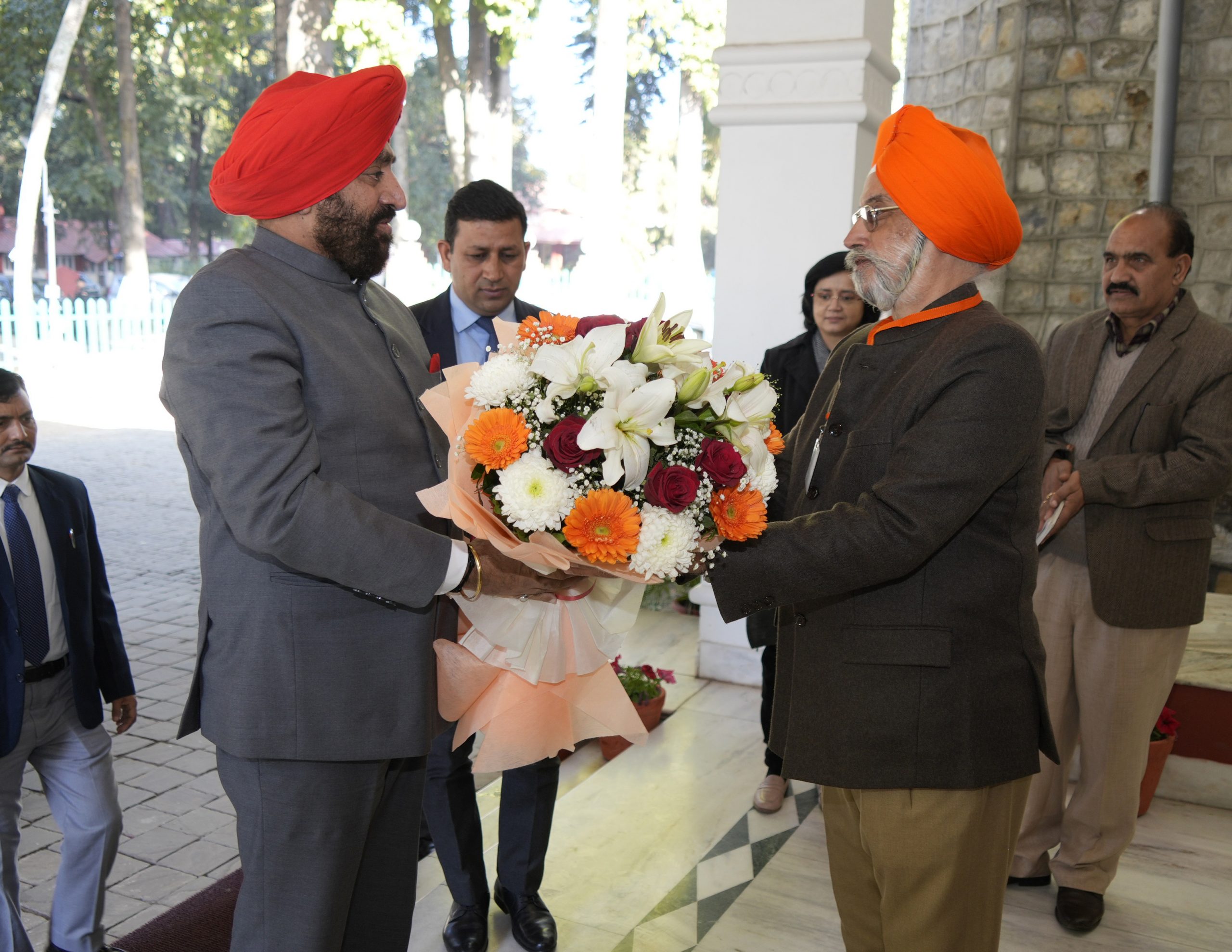 Members of Nihal Nihal Nihal Production House welcoming the Governor at Raj Bhawan Auditorium.