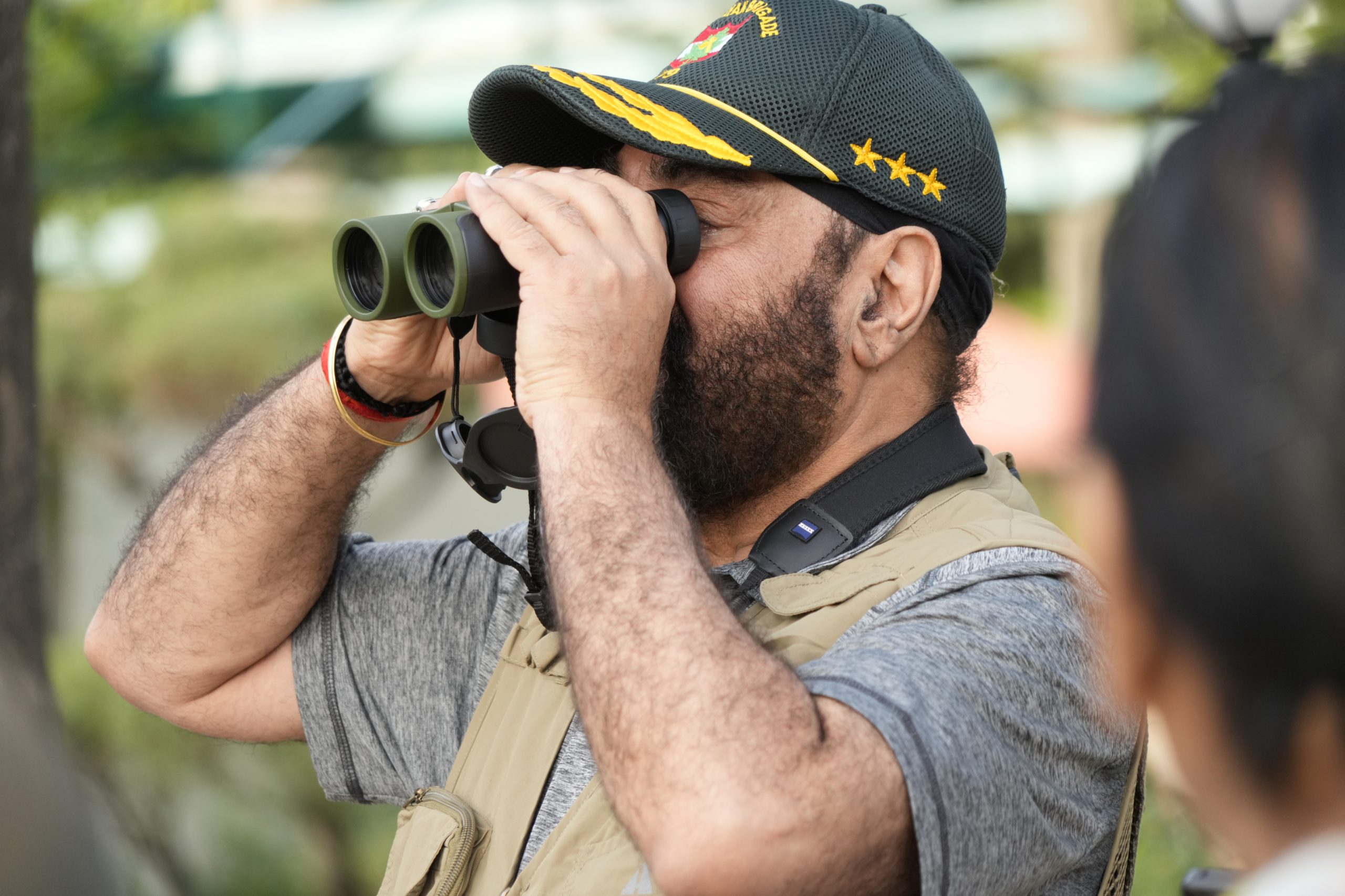 Governor observing birds during a bird-watching session in the Rajbhawan premises.