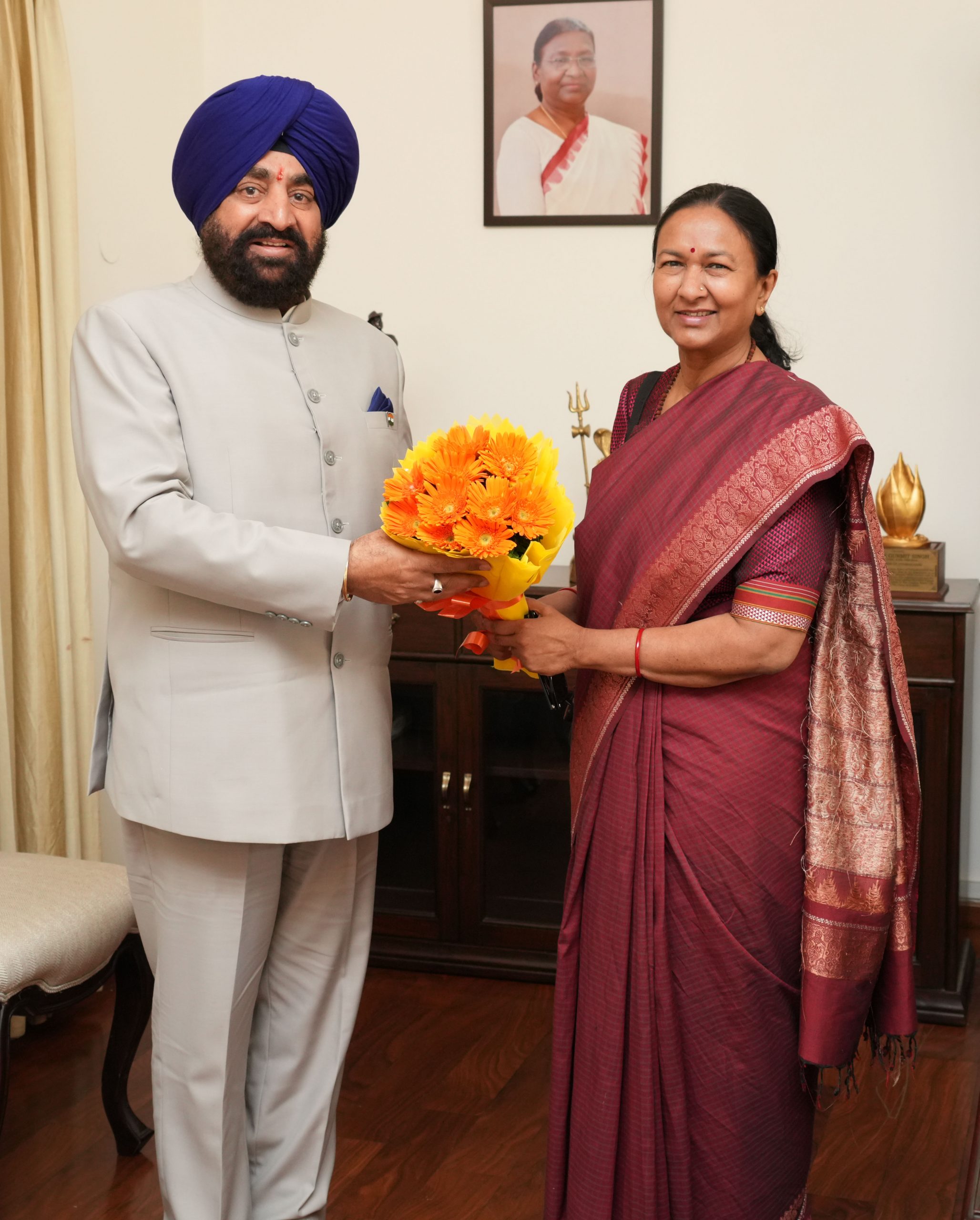 Chief Secretary Smt. Radha Raturi paying courtesy call on the Governor at Rajbhawan.