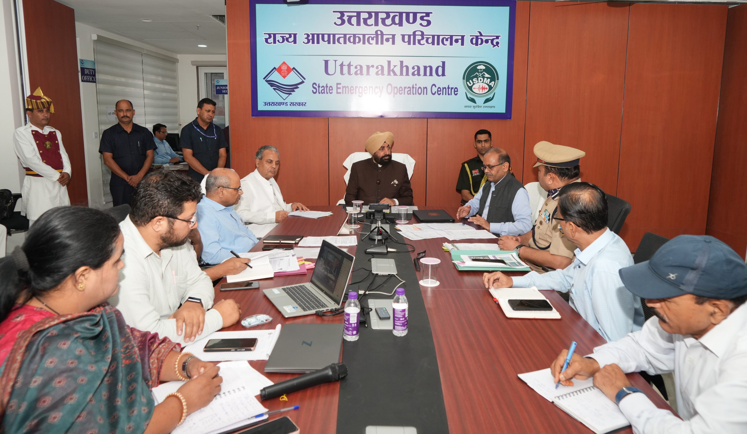 Hon'ble Governor in conversation with the officials during a meeting at the newly constructed Uttarakhand State Disaster Management Authority at IT Park.