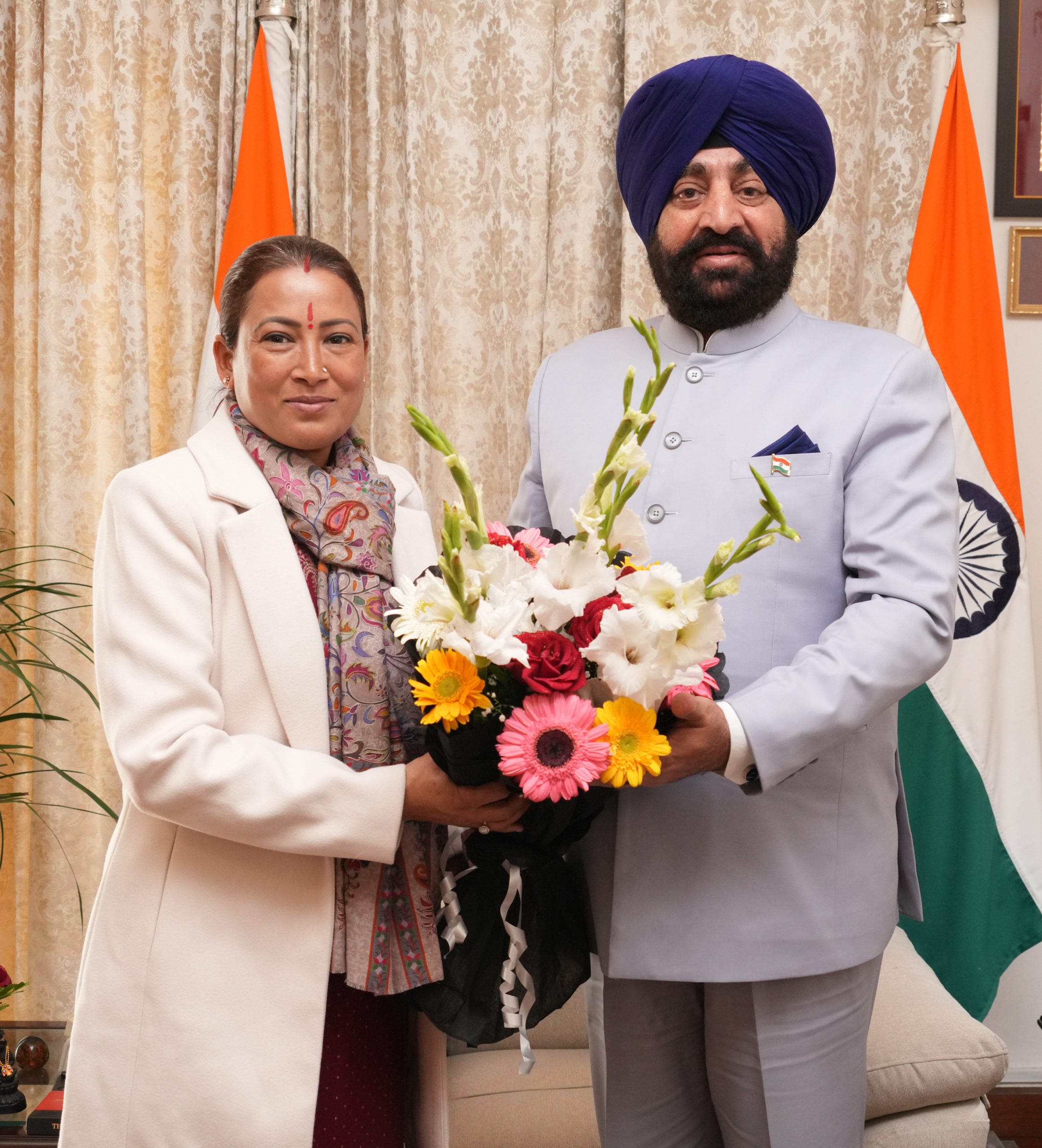 Cabinet Minister Mrs. Rekha Arya paying a courtesy call on the Governor.