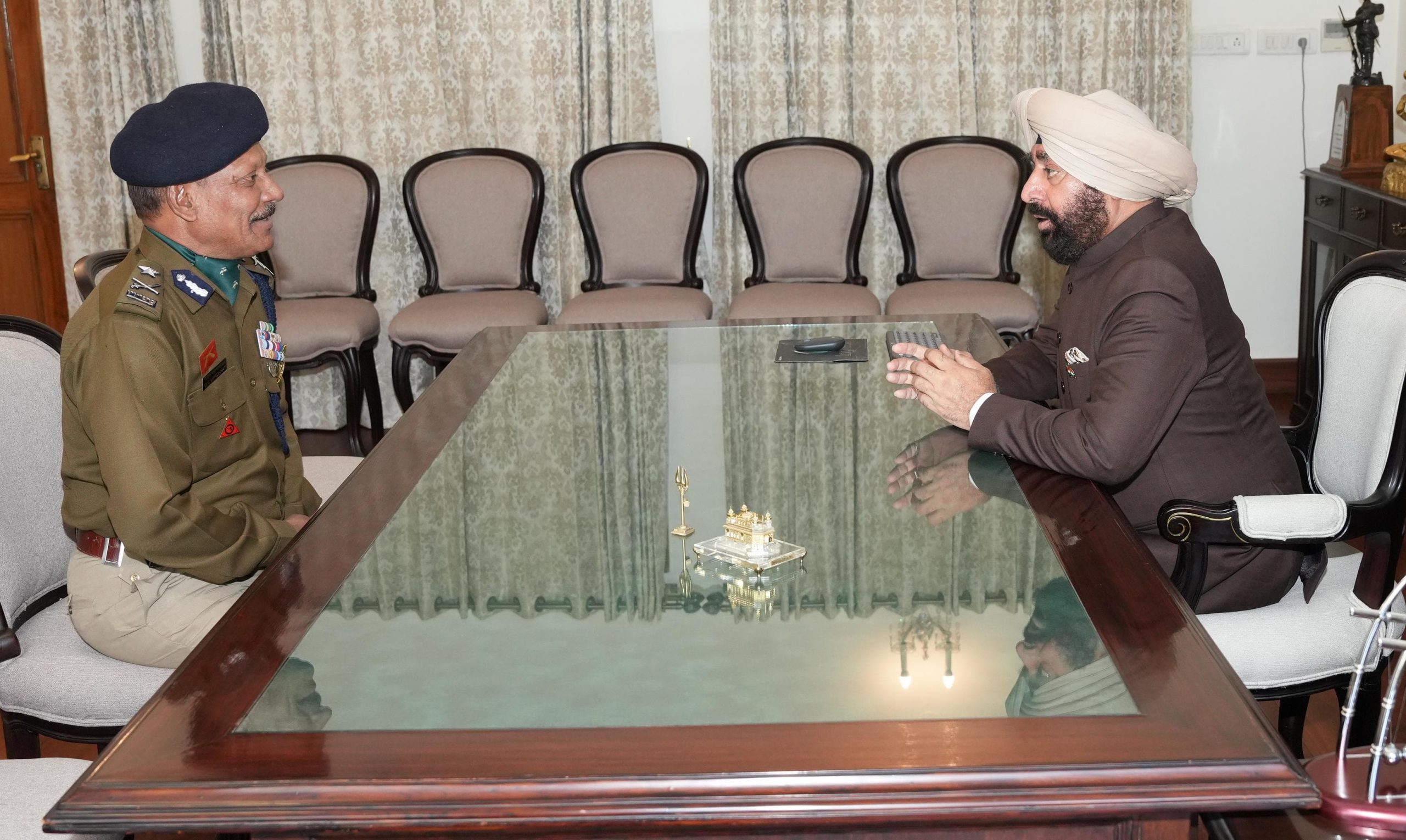 Director ITBP Academy, Mussoorie, Shri Girish Chandra Upadhyay paying a courtesy call on the Governor.